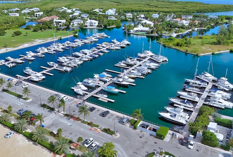 Cayman Islands Yacht Club marina with moored luxury yachts and calm waters