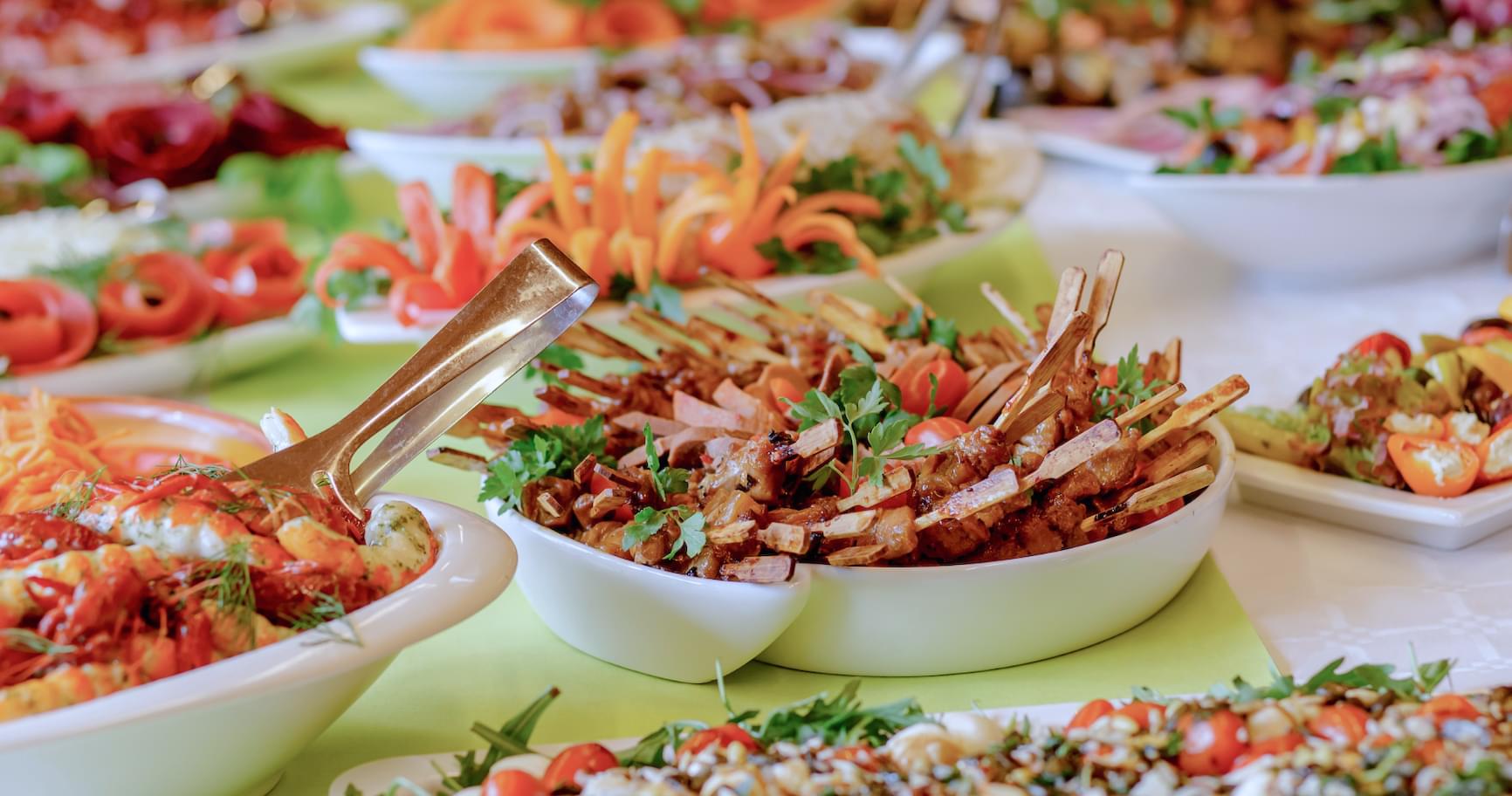 An array of delicious dishes is served at a sunset dinner cruise in Grand Cayman.