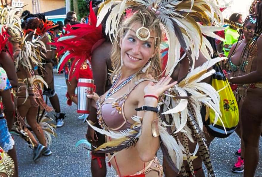 Colorful dancers at Cayman Carnival Batabano in George Town, celebrating under sunny Georgetown Grand Cayman weather