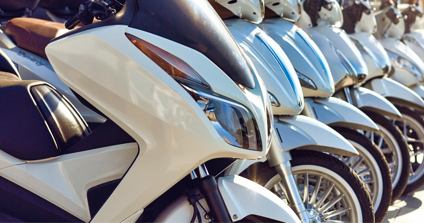 Sleek scooters are available for rent, offering eco-friendly options for scooter rental in little Cayman