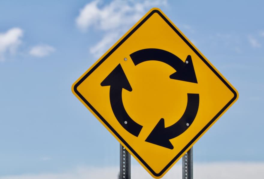 Roundabout sign guiding drivers using vehicles from car rental companies in Grand Cayman