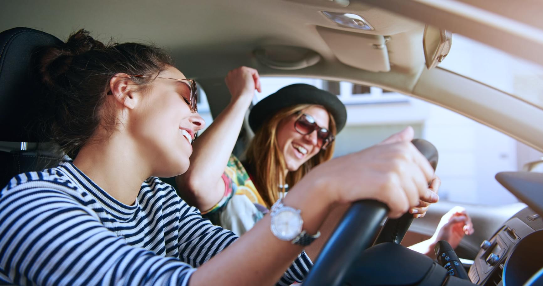 Friends enjoying a road trip, highlighting fun and ease