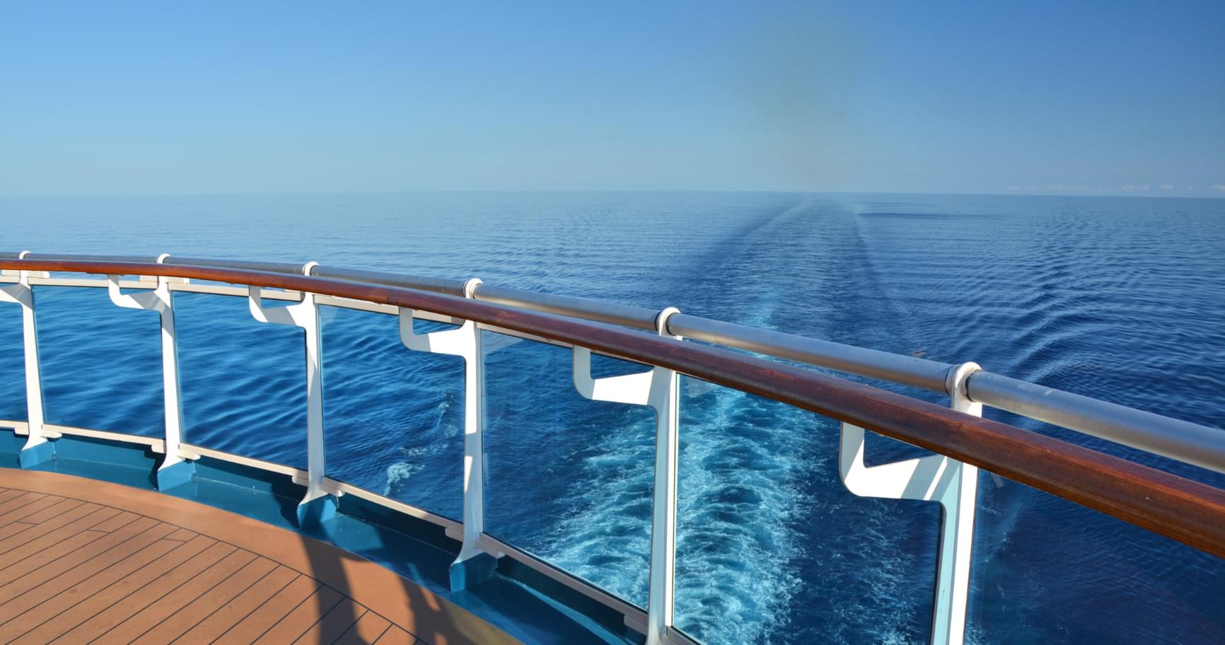 View from a cruise ship balcony showcasing the cruises to Grand Cayman