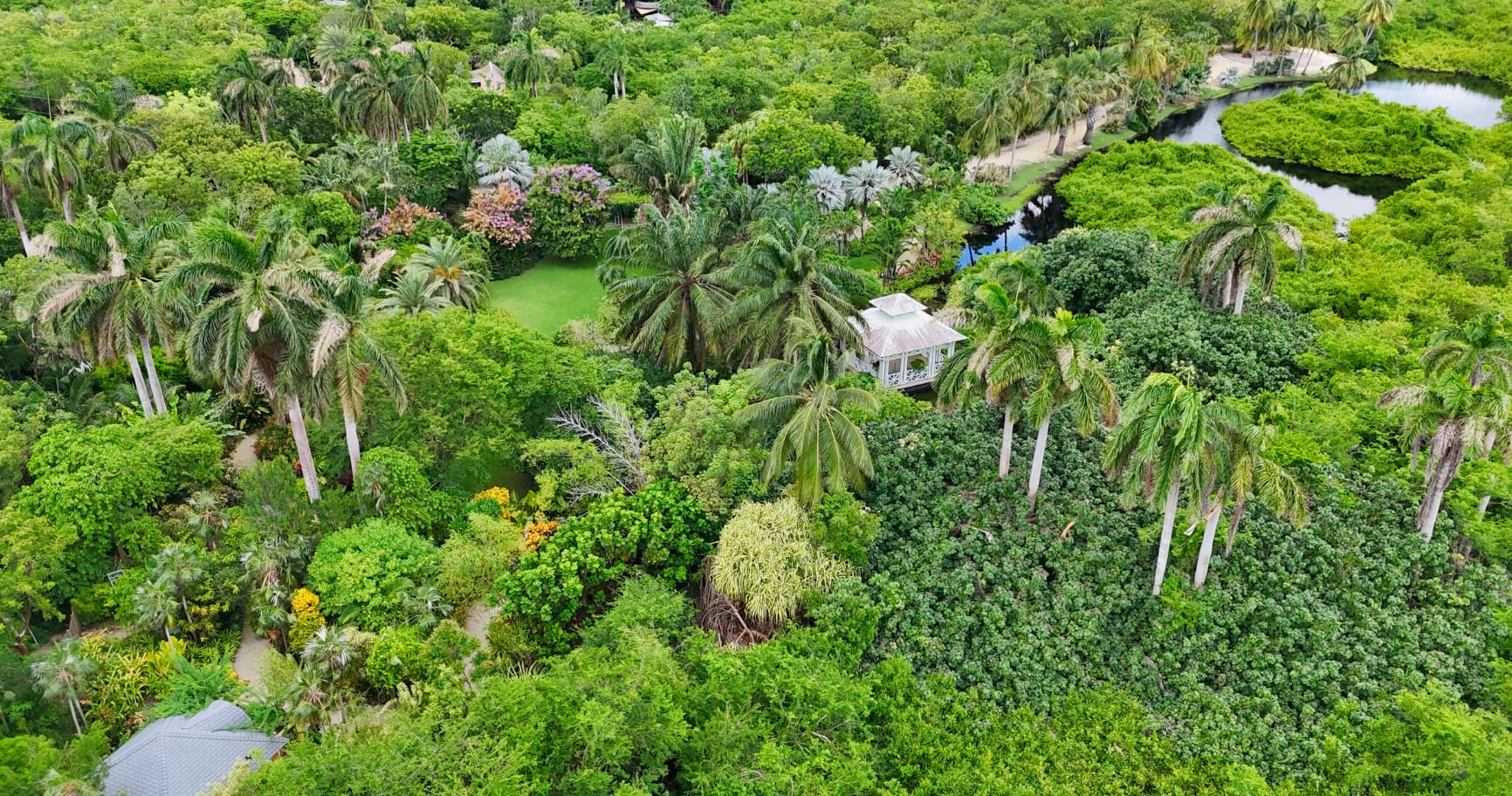 Aerial view of lush gardens at the Queen Elizabeth II Botanic Park.
