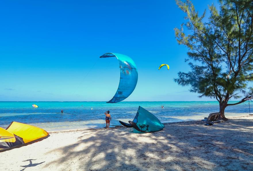 Windsurfing and beach relaxation at Rum Point are among Grand Cayman's top things to do.
