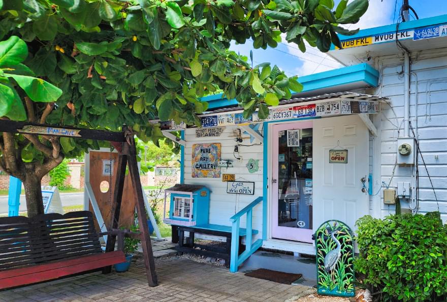 Pure Art Gallery & Gifts showcasing vibrant Caymanian architecture in Grand Cayman.