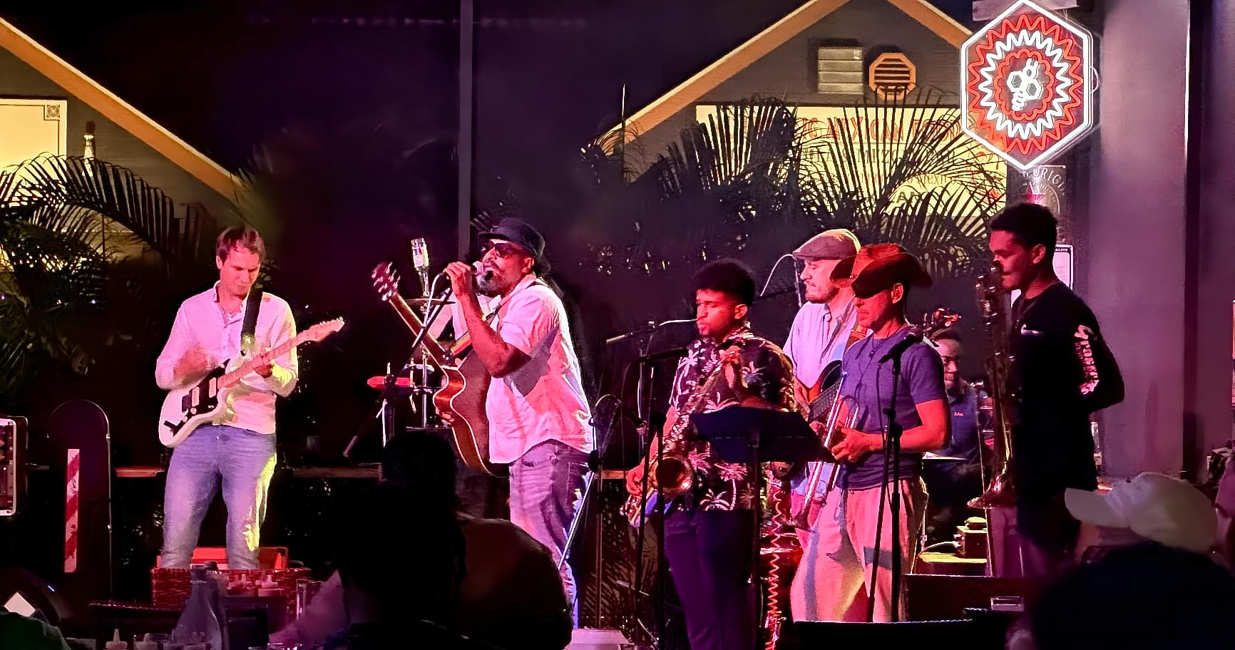 A band performing live music in a vibrant venue is one of the things to do at night in Grand Cayman.