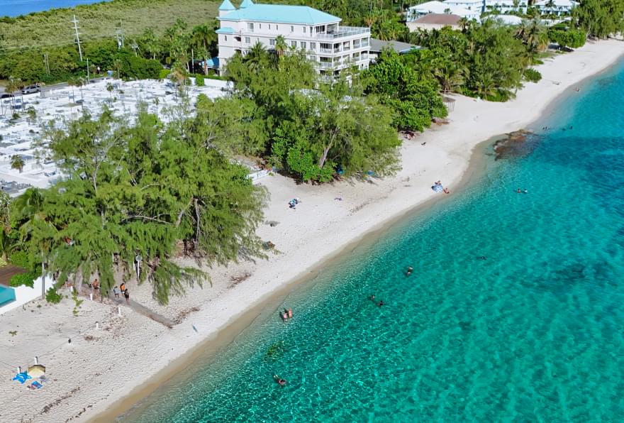 Cemetery Beach Cayman in Grand Cayman, offering shaded areas and excellent snorkeling opportunities