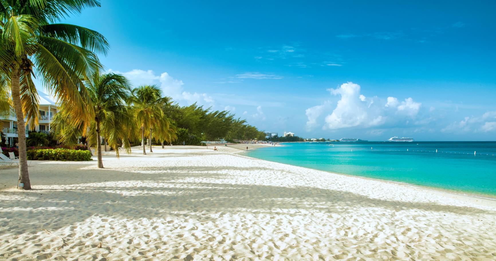 Pristine white sands of Seven Mile Beach Grand Cayman, one of the best beaches in Grand Cayman Island