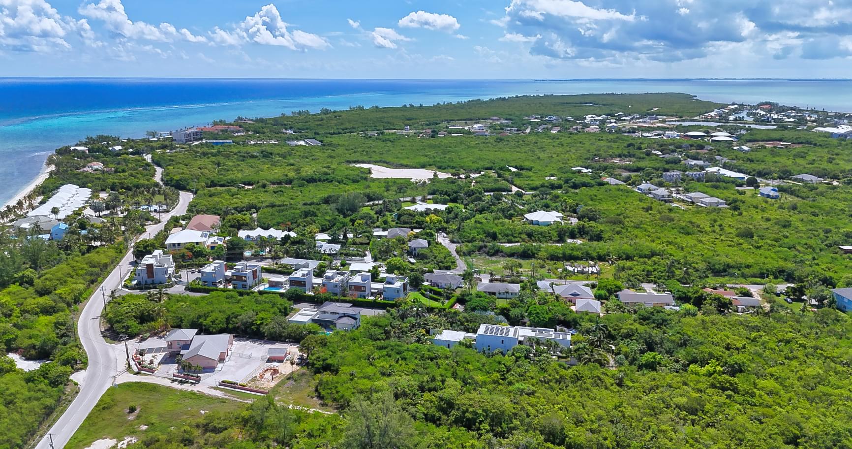 Aerial view of West Bay in Grand Cayman, showcasing its stunning coastline and natural beauty for best excursions in Cayman Islands