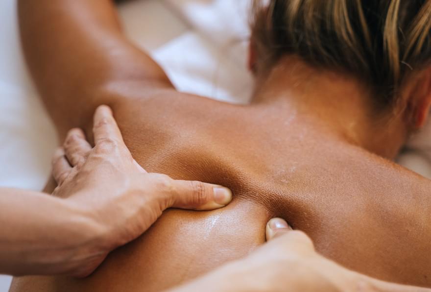 Spa massage treatment in Grand Cayman, highlighting luxury and relaxation
