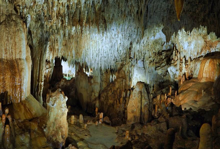 Stalactites inside Crystal Caves, a popular site for Cayman Islands cruise tours