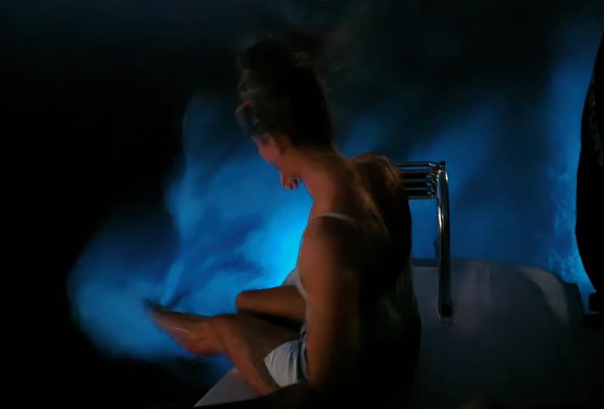 Visitor experiencing the magic of Bioluminescent Bay during a night excursion