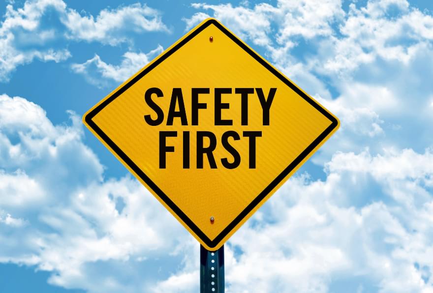 "Safety First" sign, emphasizing the importance of following safety guidelines