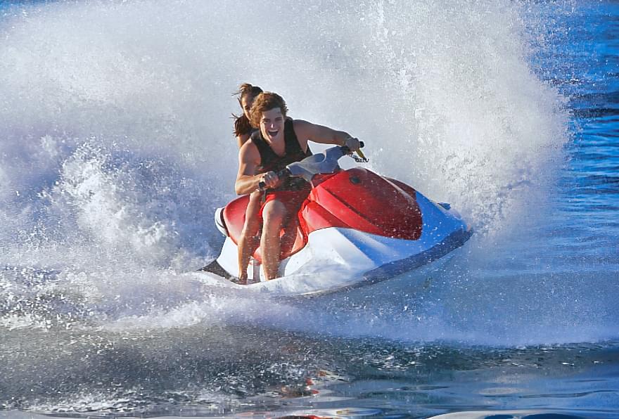 Rider on a jet ski, showcasing the thrill of safe water sports
