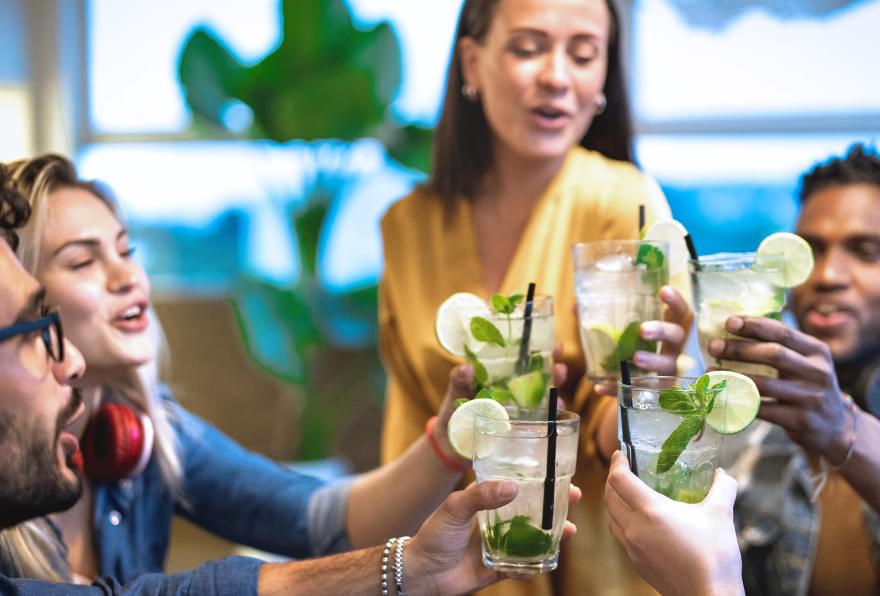 Group enjoying cocktails, showing the balance of fun and safety onboard