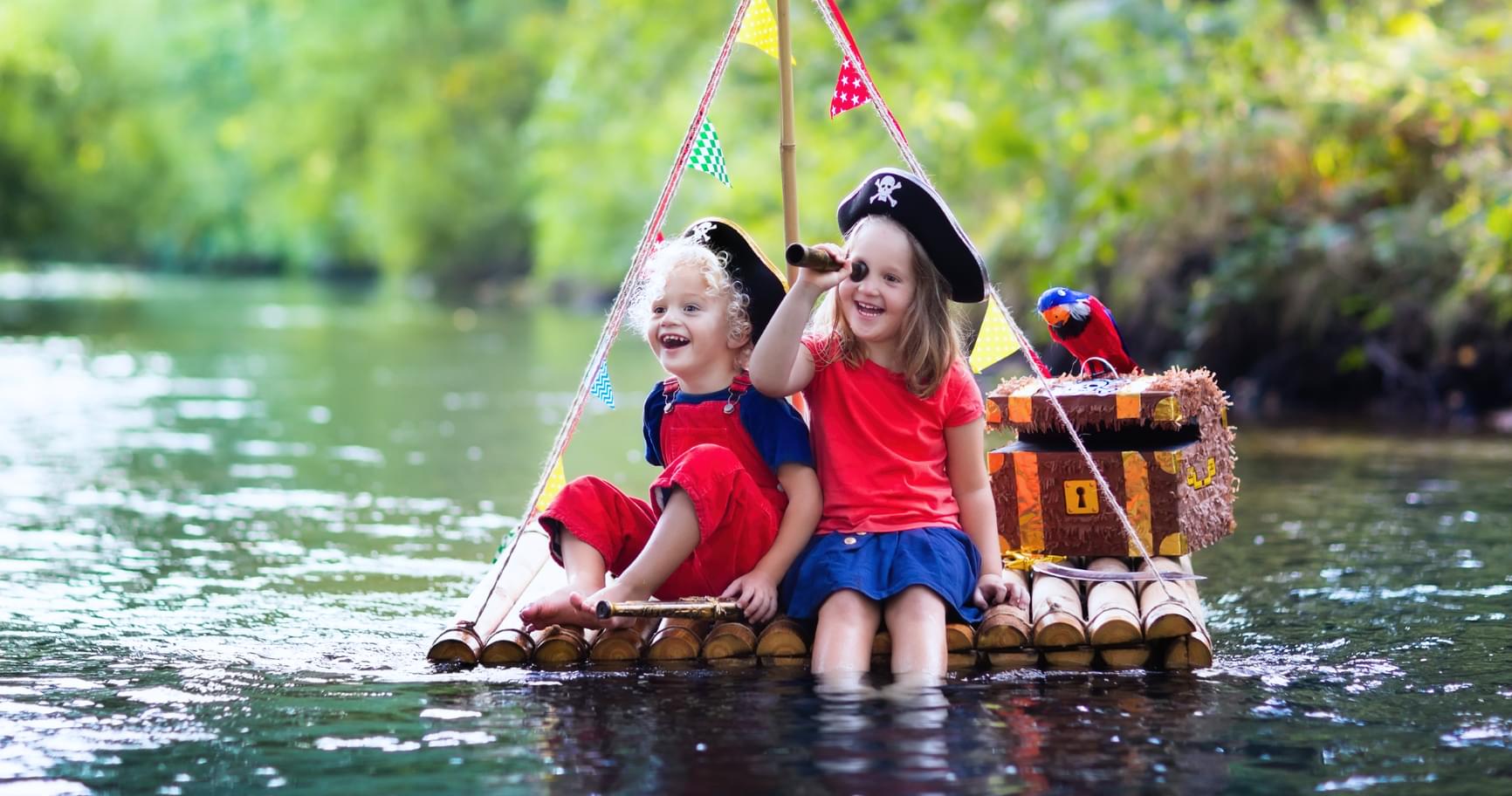 Children rafting, enjoying a safe and guided outdoor water adventure
