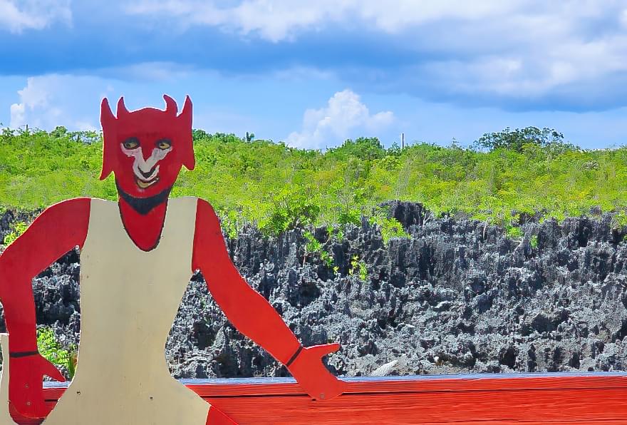 Devil-themed sign at Grand Cayman Hell, adding to the quirky charm