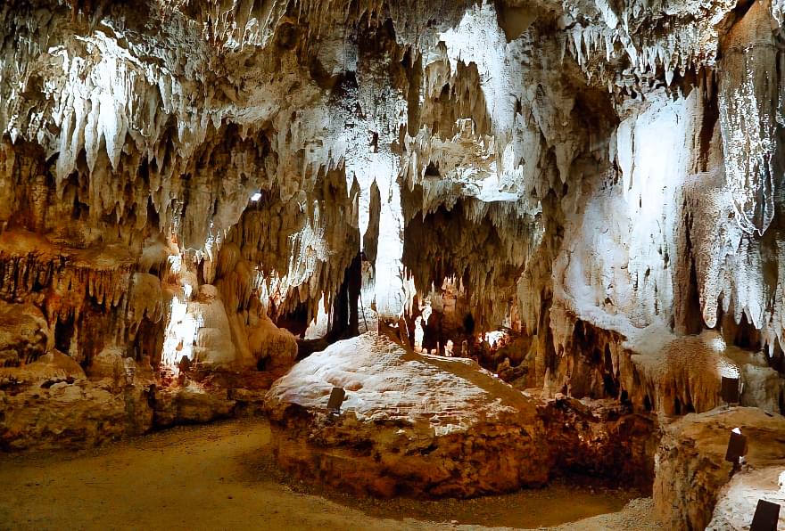 Stunning stalactites and stalagmites in the Grand Cayman Crystal Caves, offering a magical underground experience