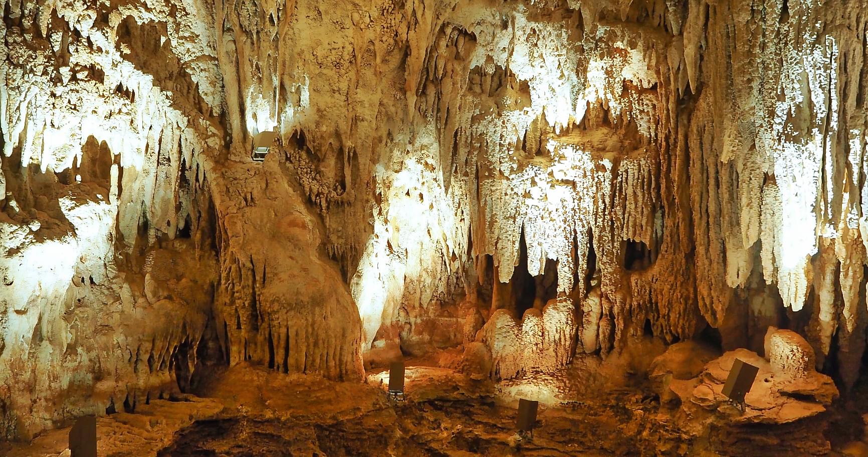 Illuminated formations in the Crystal Caves Cayman, showcasing the beauty of this natural wonder
