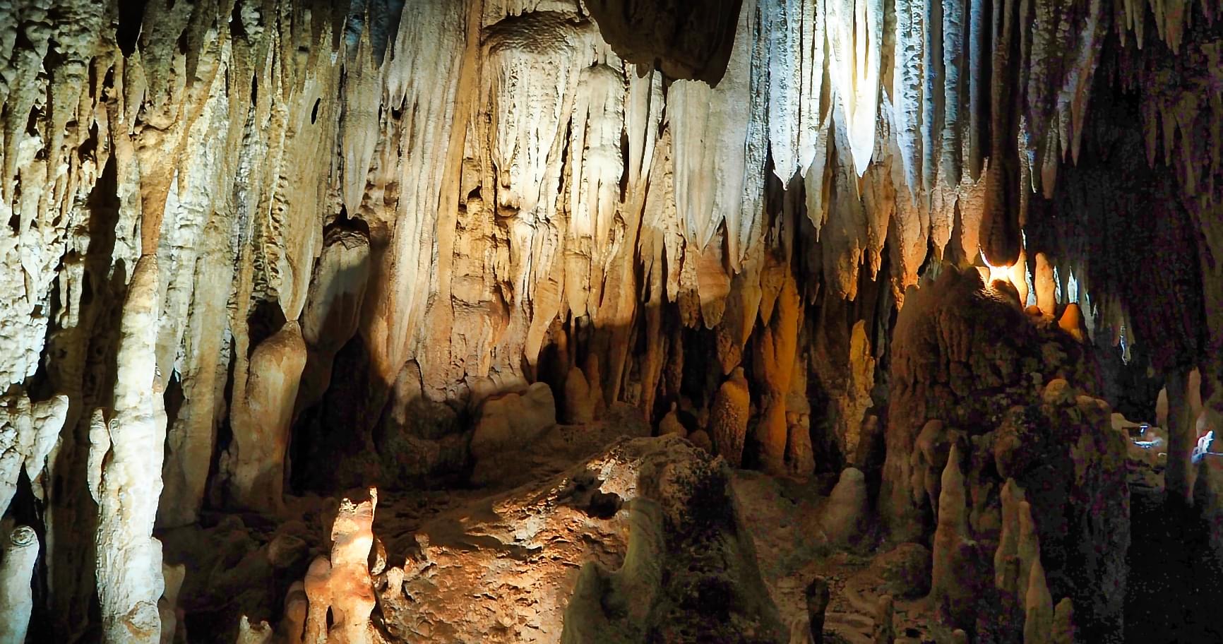 Dramatic stalactites hanging in the Caves in the Cayman Islands, perfect for photography enthusiasts