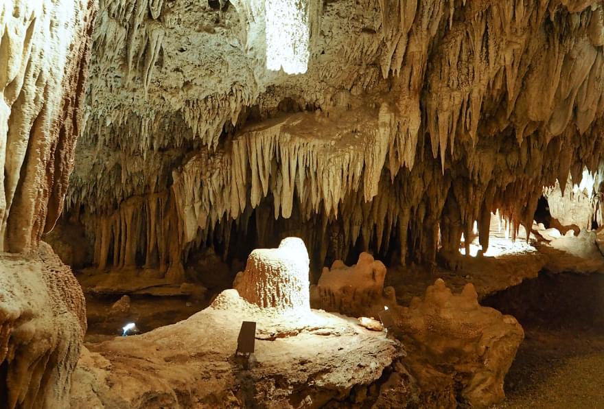 Intricate stalagmite and stalactite formations inside the caves, showcasing nature’s artistry