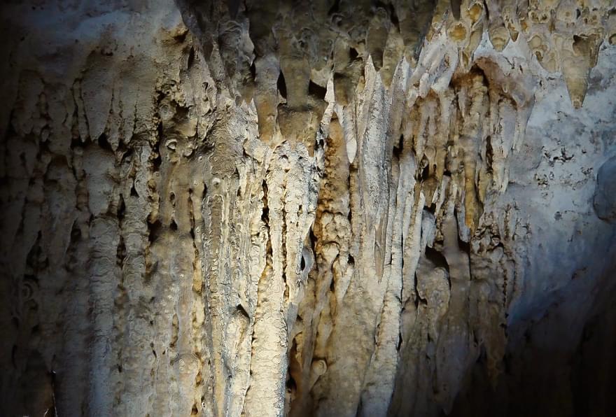 Close-up of delicate stalactites, highlighting intricate details