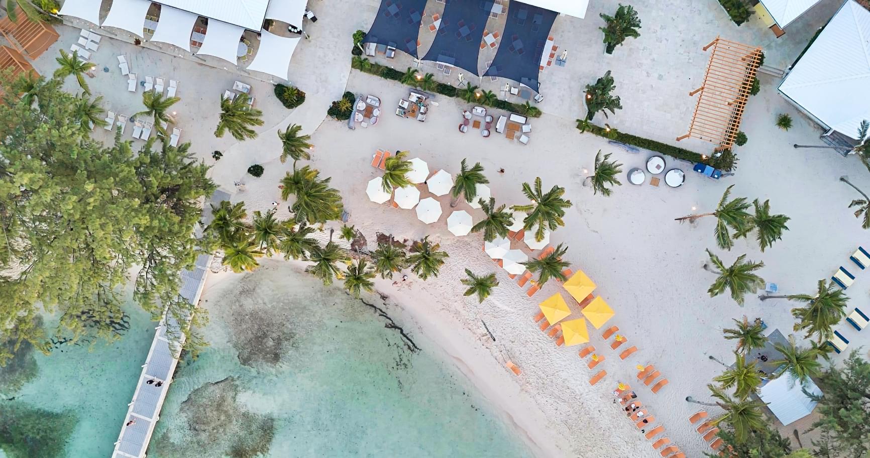 Aerial view of Rum Point Grand Cayman, showcasing its pristine beach and clear waters
