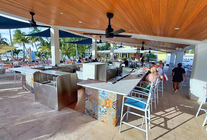 Casual beachside restaurant at Rum Point Beach, perfect for tropical dining