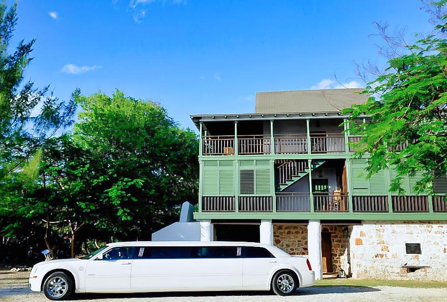 Luxury limousine arrival showcasing elegance for Grand Cayman wedding packages celebrations