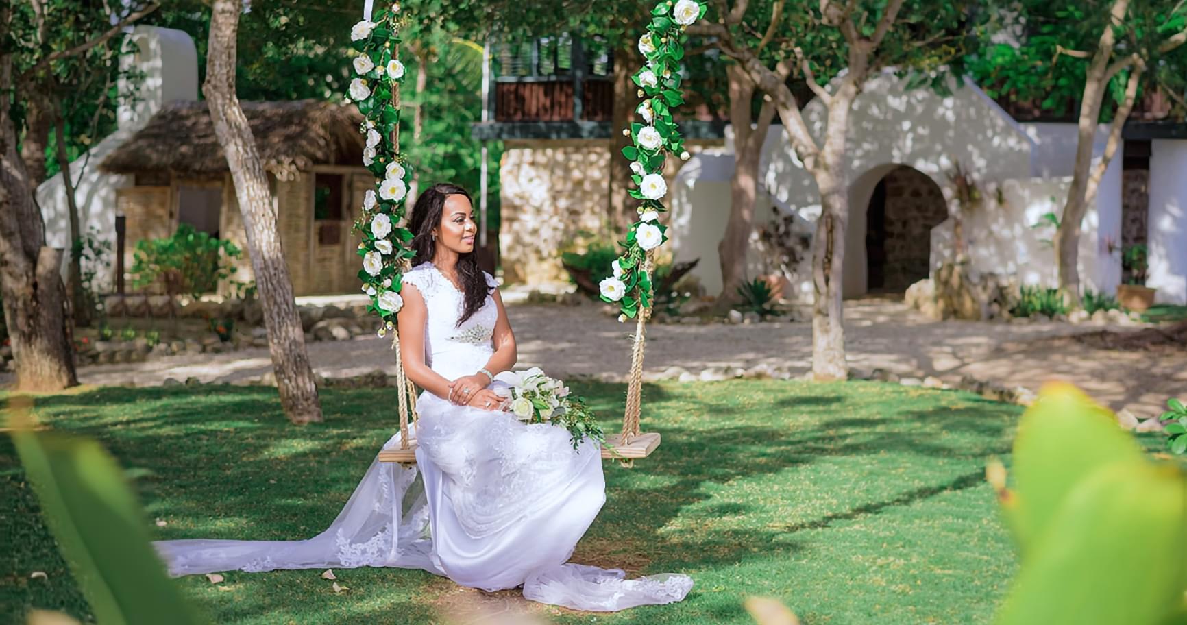 Bride in Pedro St. James courtyard highlighting charm and heritage