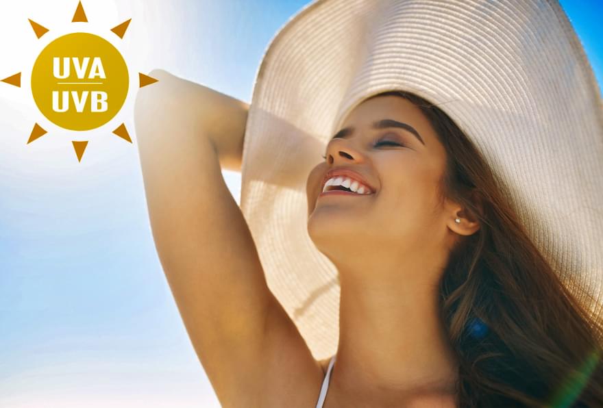 Woman applying reef-safe sunscreen, promoting eco-friendly and skin-safe products