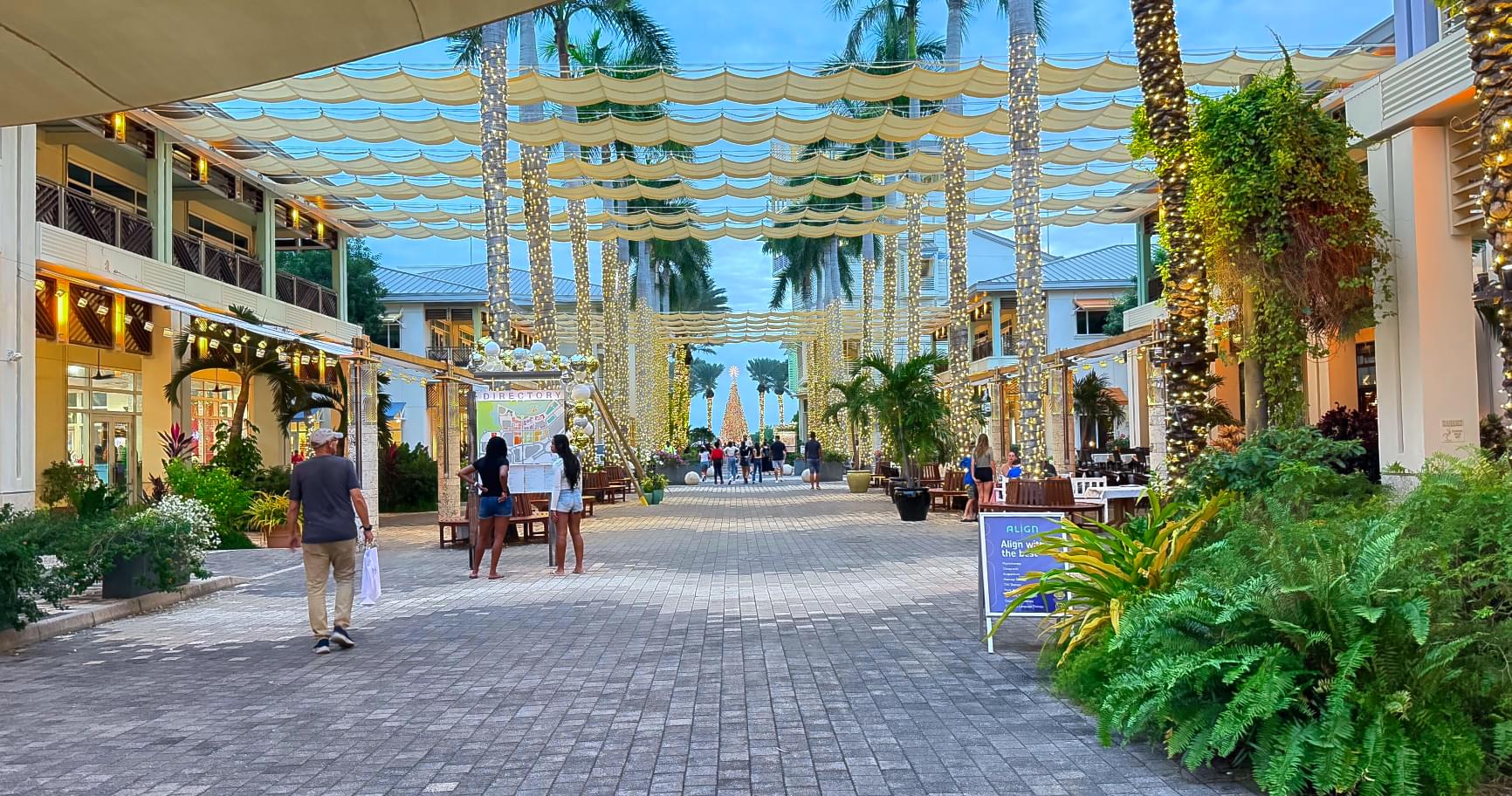 Architectural walkways in Camana Bay, featuring upscale shopping and dining options