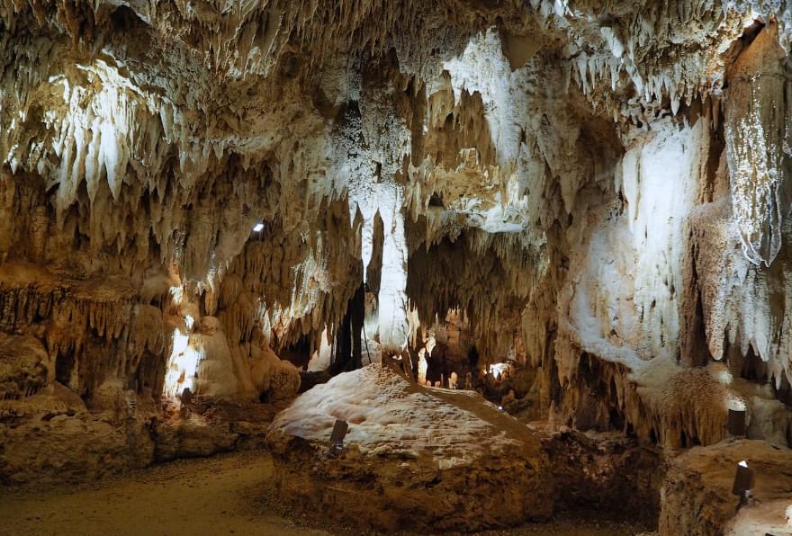 inside crystal caves with stalactites and rock formations in grand cayman